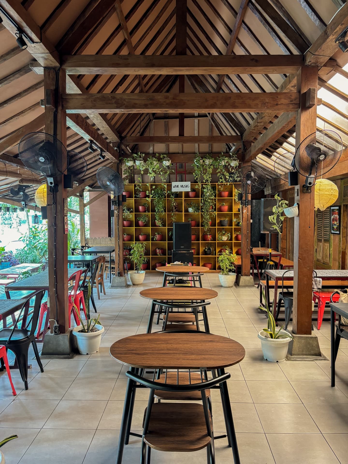 Interior view showing wooden details and plants